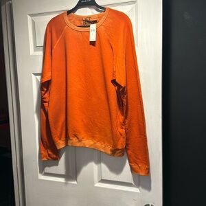 Free city orange lightweight sweatshirt.